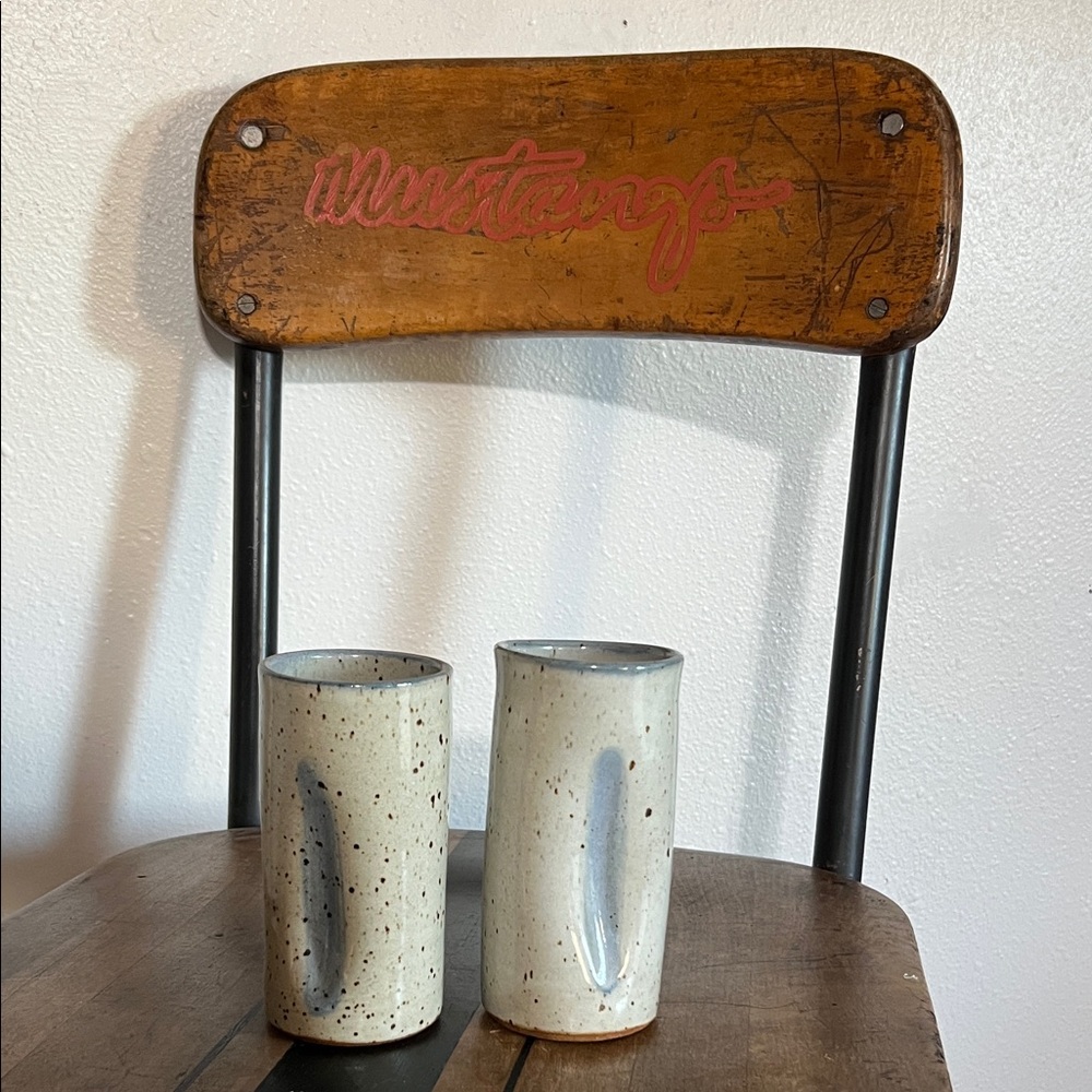 Handmade pair pottery drinking glasses cream speckled with blue details curved